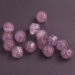 Close-up view of sparkling faceted pink crystal beads for creative DIY jewelry making