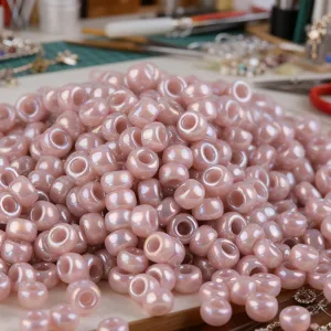 Pink pearl round seed beads for DIY jewelry making and craft accessories close up display