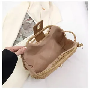 Woven straw crossbody bag for women, large capacity beach vacation shoulder handbag.