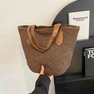 Woven straw tote bag for women, large capacity beach handbag and casual commuter shoulder bag.