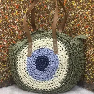 Round straw woven shoulder bag for women, handmade beach vacation casual large capacity bag.