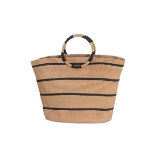 Woven straw beach tote bag with black stripes and round handles for women summer vacation.