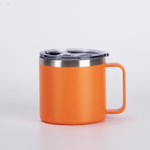 Stainless steel coffee mug detail showing orange matte finish, clear lid, and sturdy handle.