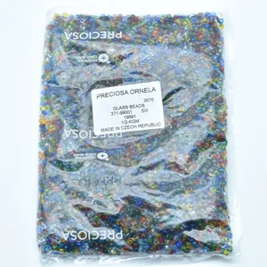Detailed view of mixed color Czech glass beads in sealed package, perfect for DIY jewelry making.