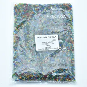 Detail view of Preciosa mixed glass seed beads in transparent packaging, size 6/0.