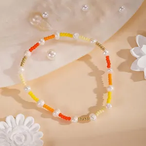 Braccialetto di perline colorate e perle, elegante gioiello regalo per la migliore amica.