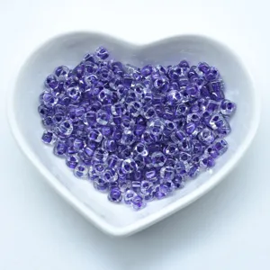 High quality purple triangle seed beads for DIY jewelry making crafts and beading projects.