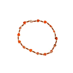Handmade summer heart beaded bracelet with golden spacers and colorful beads for women daily wear.