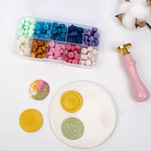 Wax seal beads kit with transparent storage box, multi-color octagonal sealing wax for crafts.