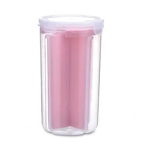 Transparent kitchen storage jar with pink dividers and sealed lid for dry food snacks.