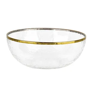 Clear glass salad bowl with hammered texture and elegant gold rim for home dining table decor.