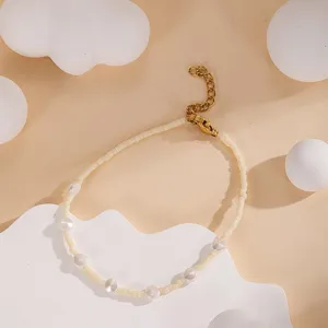 Summer minimalist handmade seed bead pearl bracelet with adjustable golden extension chain.