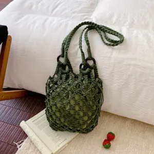 Green macrame bucket bag, knitted hollow hobo handbag with inner pouch for stylish daily use.
