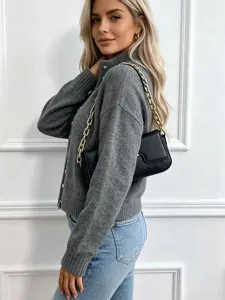 Women grey knit zipper cardigan sweater, detail view of cozy long sleeve winter outerwear.