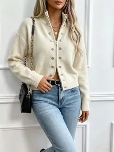 Detailed view of stylish women's beige knit zipper cardigan with elegant metal button decor.