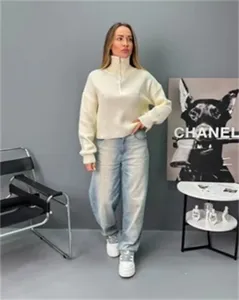 Pull en tricot ample col cheminée demi-zip pour femme haut décontracté manches longues.