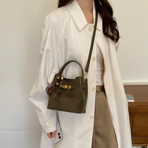 Vintage suede bucket bag for women, luxury minimalist shoulder bag with elegant lock detail