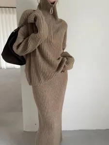 Detail view of the cozy half-zipper ribbed knit sweater and midi skirt two-piece set.