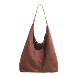 Brown suede hobo shoulder bag detailed view, minimalist casual daily commute handbag.