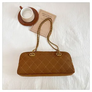 Brown quilted chain shoulder bag, retro suede baguette handbag, chic crossbody fashion purse