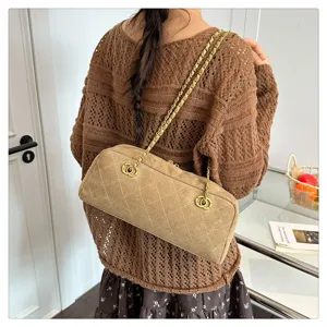 Vintage suede quilted chain shoulder bag, retro baguette bowling handbag for women.