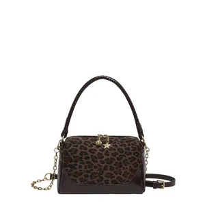 Chic leopard print shoulder handbag with top handle and stylish chain strap for commute.