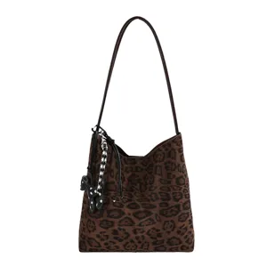 Brown leopard print suede shoulder bag detail, elegant bucket bag with cute puppy charm.