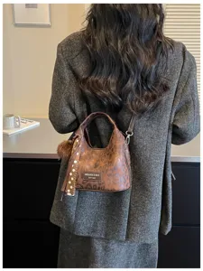 Koreanischer Stil modische Leo-Handtasche Retro minimalistische Umhängetasche Detail