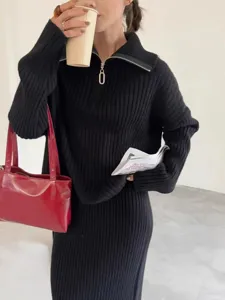 Detailed view of the stylish half-zip lapel knit sweater set, elegant black design.