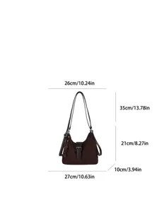 Dark brown suede hobo shoulder bag with casual design, spacious capacity and metallic buckle.