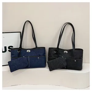Καθημερινή τσάντα denim tote με ασορτί πορτοφολάκι, κομψό κούμπωμα και διπλές λαβές.