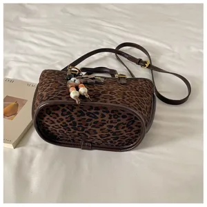 Chic leopard print tote bag with shoulder strap, stylish vintage casual crossbody bag.
