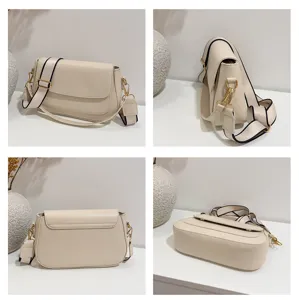Schicke minimalistische beige Umhängetasche mit breitem Gurt, stilvolle lässige Alltagstasche.