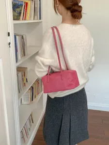 Pink suede shoulder bag with long straps, stylish daily commute pillow underarm bag