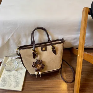 Vintage retro suede patchwork tote bag casual shoulder crossbody bag with cute flower pendant.