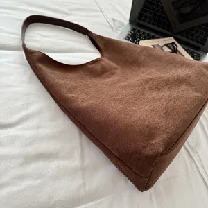 Brown suede hobo shoulder bag for women, minimalist daily commute handbag with leather strap.