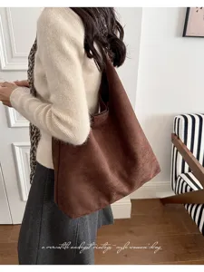 Brown suede hobo bag for women, vintage casual shoulder handbag, large capacity commuter tote.