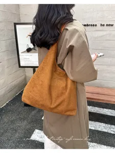 Classic brown suede hobo shoulder bag, minimalist casual commuting tote bag for women.