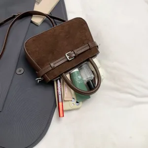 Vintage brown suede handbag for women, chic minimalist crossbody bag with elegant belt detail.