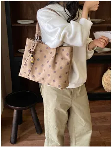 Brown polka dot tote bag for women, large capacity shoulder bag for daily commuting.