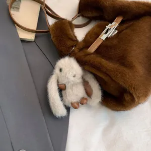 Korean style brown plush shoulder bag with cute rabbit pendant, soft faux fur hobo handbag.