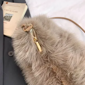 Plush shoulder bag for women, fluffy crossbody handbag, stylish commuting chic winter bag.