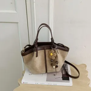 Stylish canvas leather bucket bag detail, large capacity shoulder handbag for women commute.