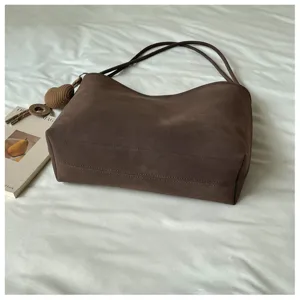 Brown suede tote bag detail, minimalist vintage shoulder bag, large capacity daily use.