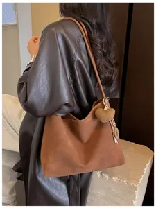 Retro brown shoulder tote bag for women, large capacity minimalist daily commute handbag.