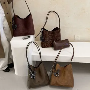 Vintage suede bucket bag with leopard print and pouch, casual women retro commuter handbag.