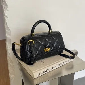 Borsa a tracolla trapuntata nera minimalista retrò, elegante borsa a bauletto con dettagli dorati.