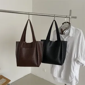 Korean style woven leather tote bag, large capacity casual shoulder bag for women daily commute.
