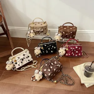 Korean sweet polka dot handbag with bow and cute bear pendant, stylish shoulder crossbody bag.