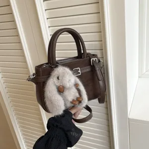 Retro minimalist suede handbag with top handle and cute bunny plush charm for women daily use